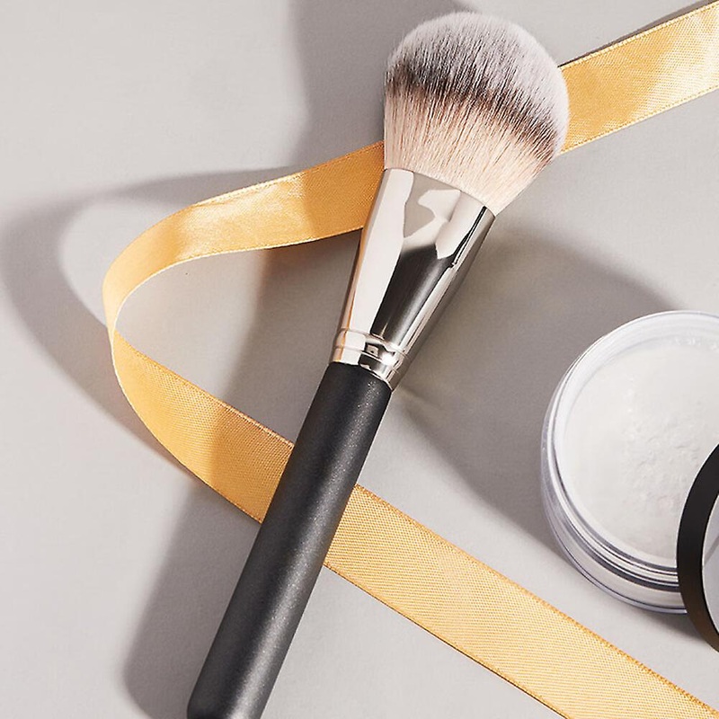 A black powder brush for beginners in a one-piece dress, easy to use.